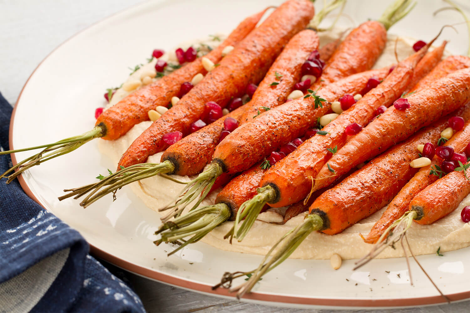 Whole-Roasted-Carrots-with-Topped-Organic-Garlic-Hommus.jpg